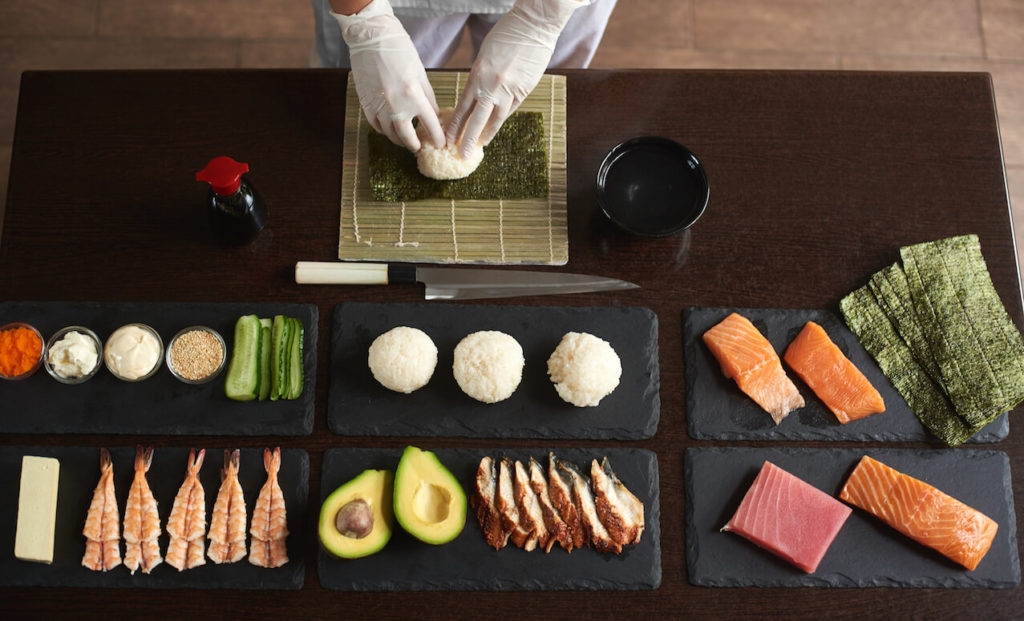 Sushi chef making sushi
