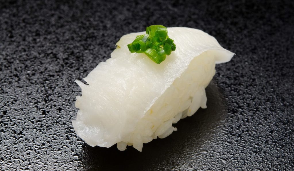 Flounder's fin nigiri sushi. Very unique in texture.