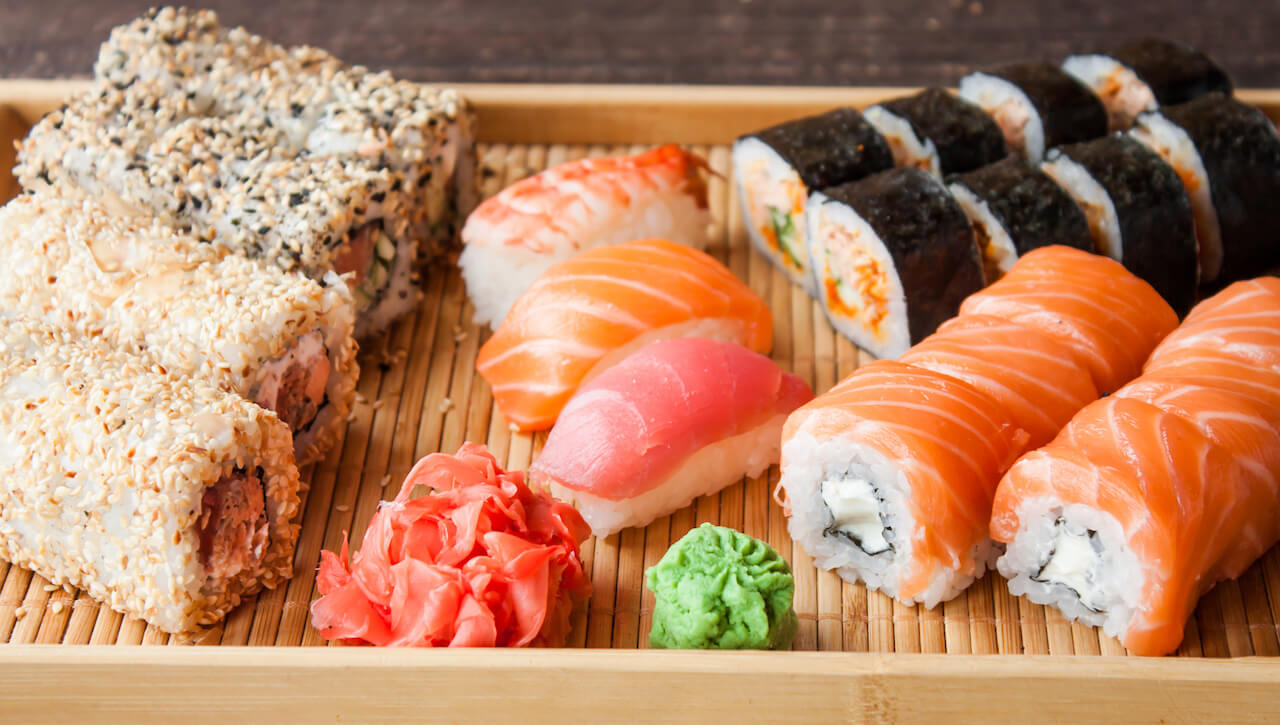 Sushi made with efficient sushi production, including rice washing machine and sushi machines