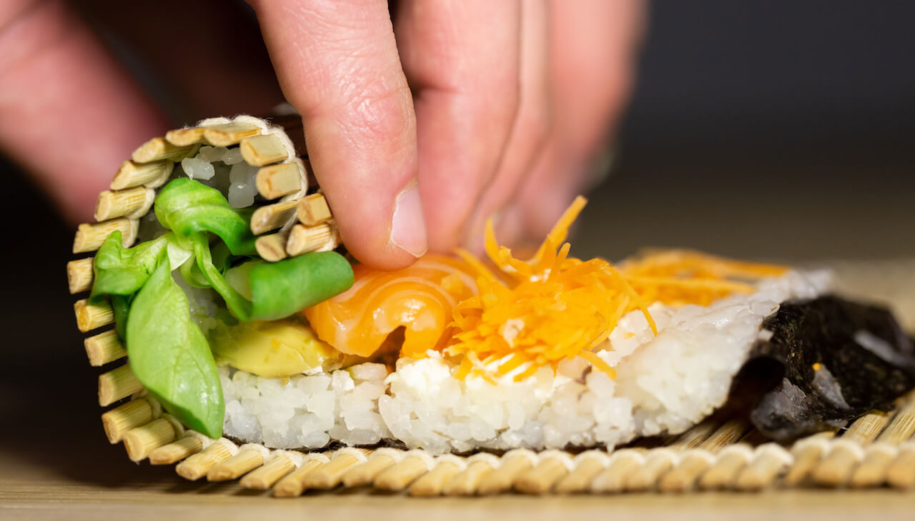 https://topsushimaker.com/wp-content/uploads/2019/10/4702-sushi-rolling.jpeg